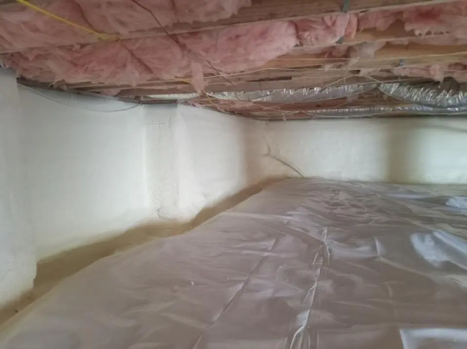 Crawl space encapsulation with closed-cell spray foam for Storm Damage Roof Repair in Rapid Valley